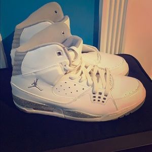 White and silver Jordan’s